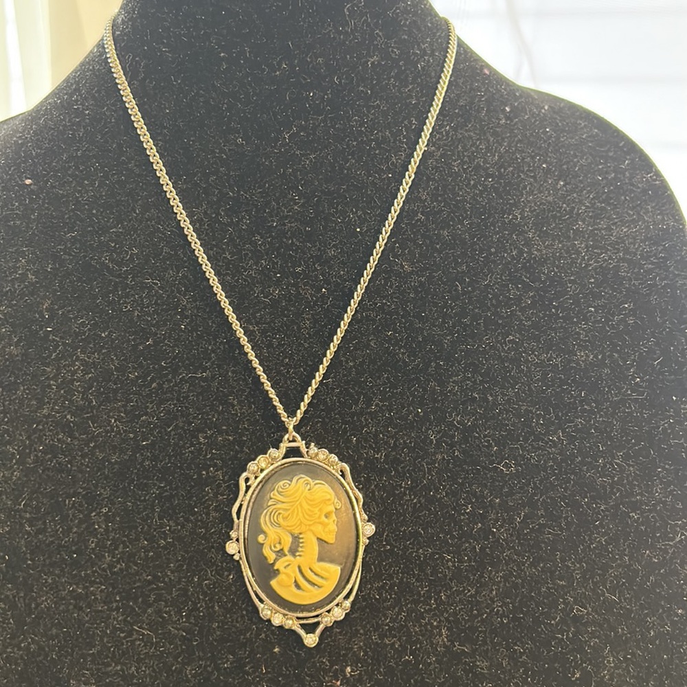 JPI  SKELETON  PENDANT WORN TWICE